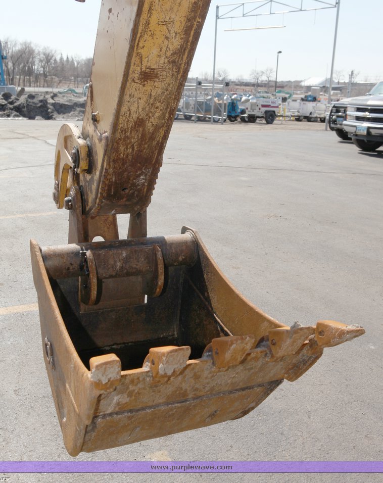 image for item 1006 2004 John Deere 310G MFWD loader backhoe