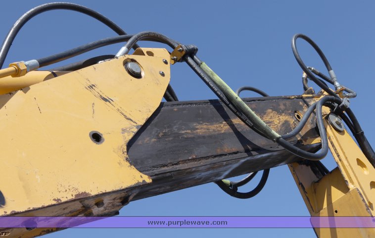 image for item 1006 2004 John Deere 310G MFWD loader backhoe