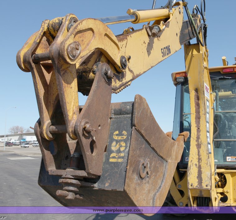 image for item 1006 2004 John Deere 310G MFWD loader backhoe