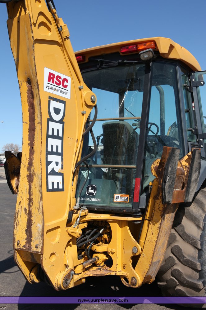 image for item 1006 2004 John Deere 310G MFWD loader backhoe