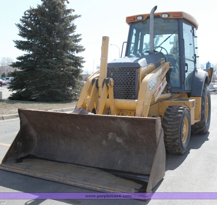 image for item 1006 2004 John Deere 310G MFWD loader backhoe