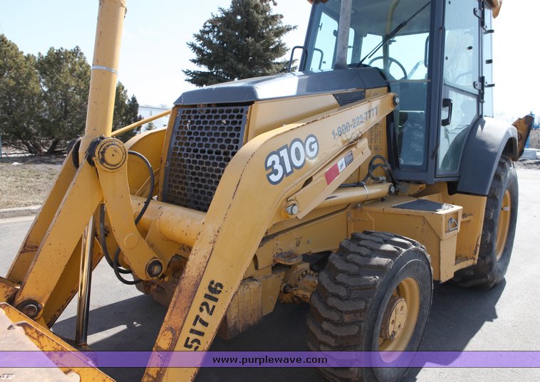 image for item 1006 2004 John Deere 310G MFWD loader backhoe
