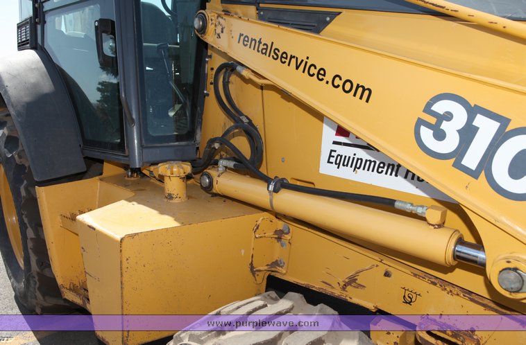 image for item 1006 2004 John Deere 310G MFWD loader backhoe