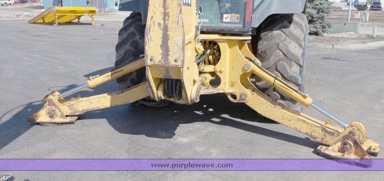 image for item 1006 2004 John Deere 310G MFWD loader backhoe