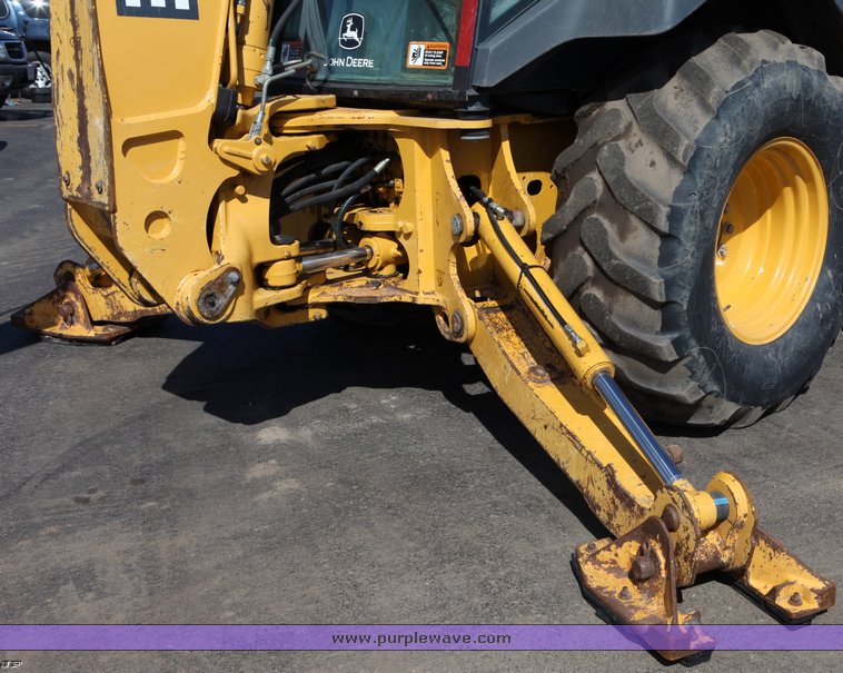 image for item 1006 2004 John Deere 310G MFWD loader backhoe
