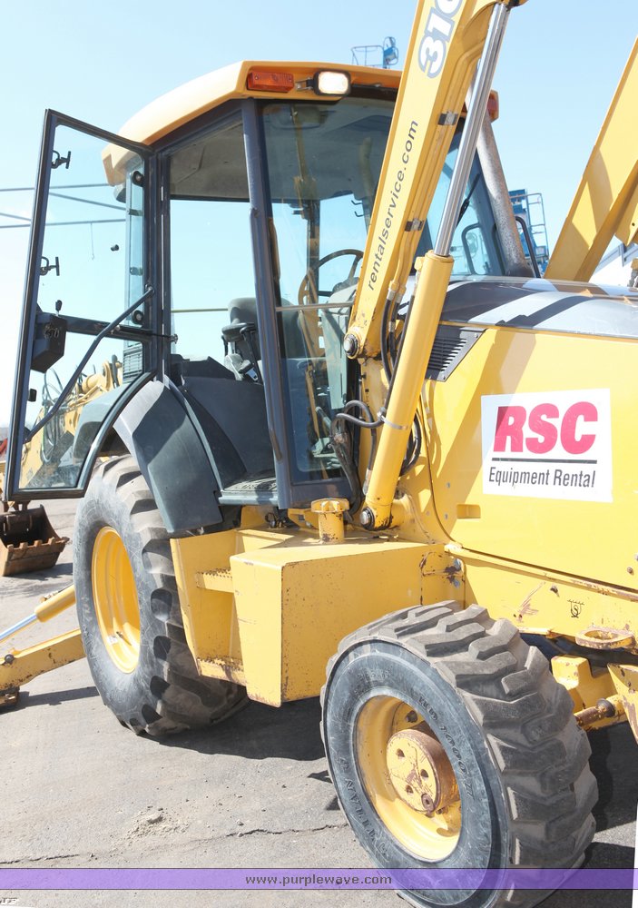 image for item 1006 2004 John Deere 310G MFWD loader backhoe