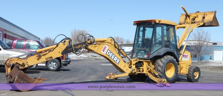 image for item 1006 2004 John Deere 310G MFWD loader backhoe