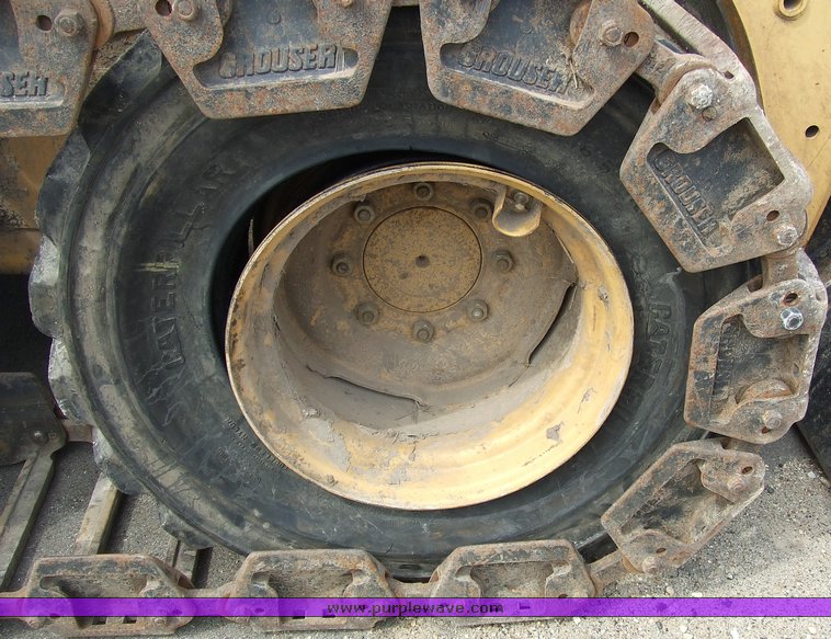 image for item 6668 2000 Caterpillar 246 skid steer