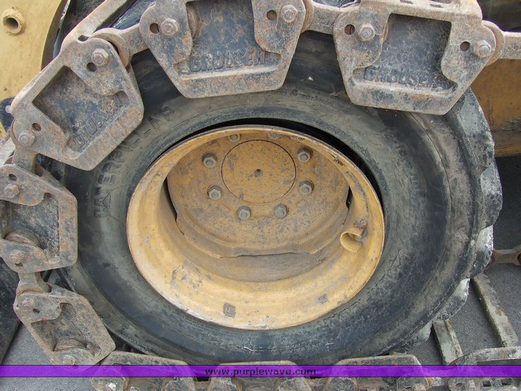 image for item 6668 2000 Caterpillar 246 skid steer