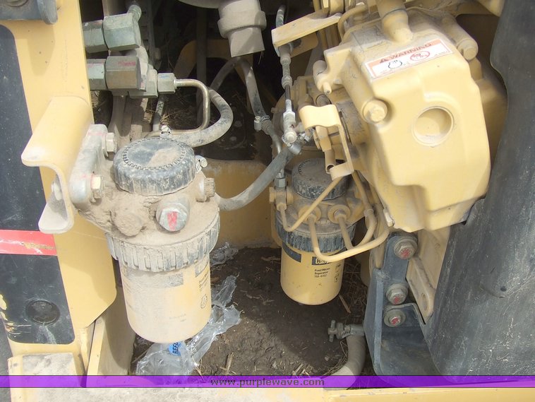 image for item 6668 2000 Caterpillar 246 skid steer