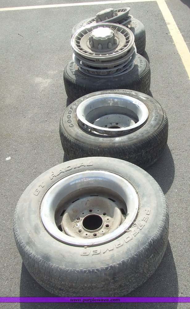 image for item 6674 Assorted tires with rims and hubcaps
