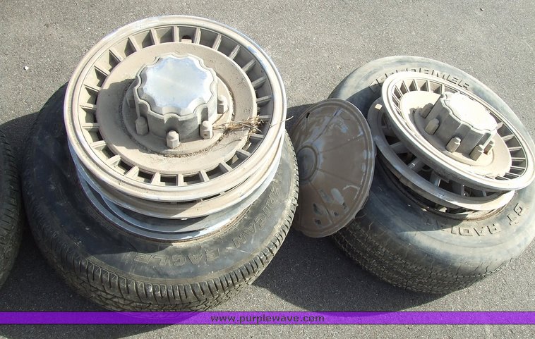 image for item 6674 Assorted tires with rims and hubcaps