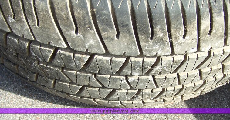 image for item 6674 Assorted tires with rims and hubcaps