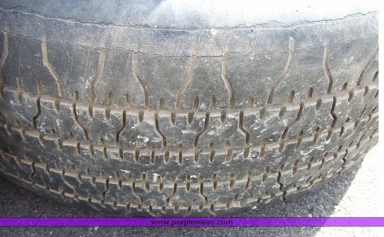 image for item 6674 Assorted tires with rims and hubcaps