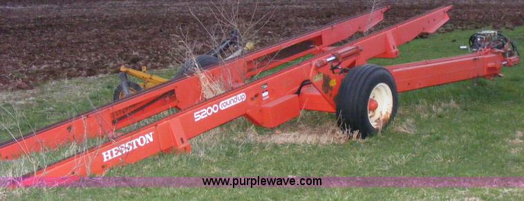image for item 1051 Hesston 5200 roundup round bale mover