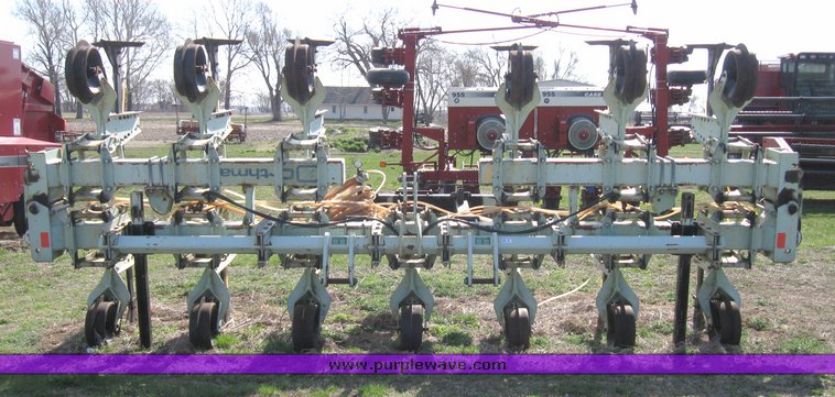 image for item 2135 1991 Orthman 1230 12 row super sweep