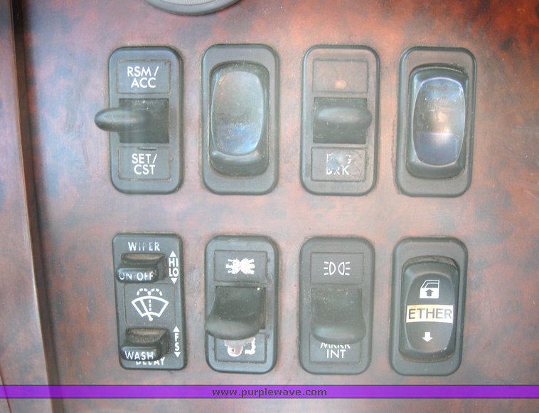 image for item 3969 1998 Freightliner Conventional FLC120 semi tractor