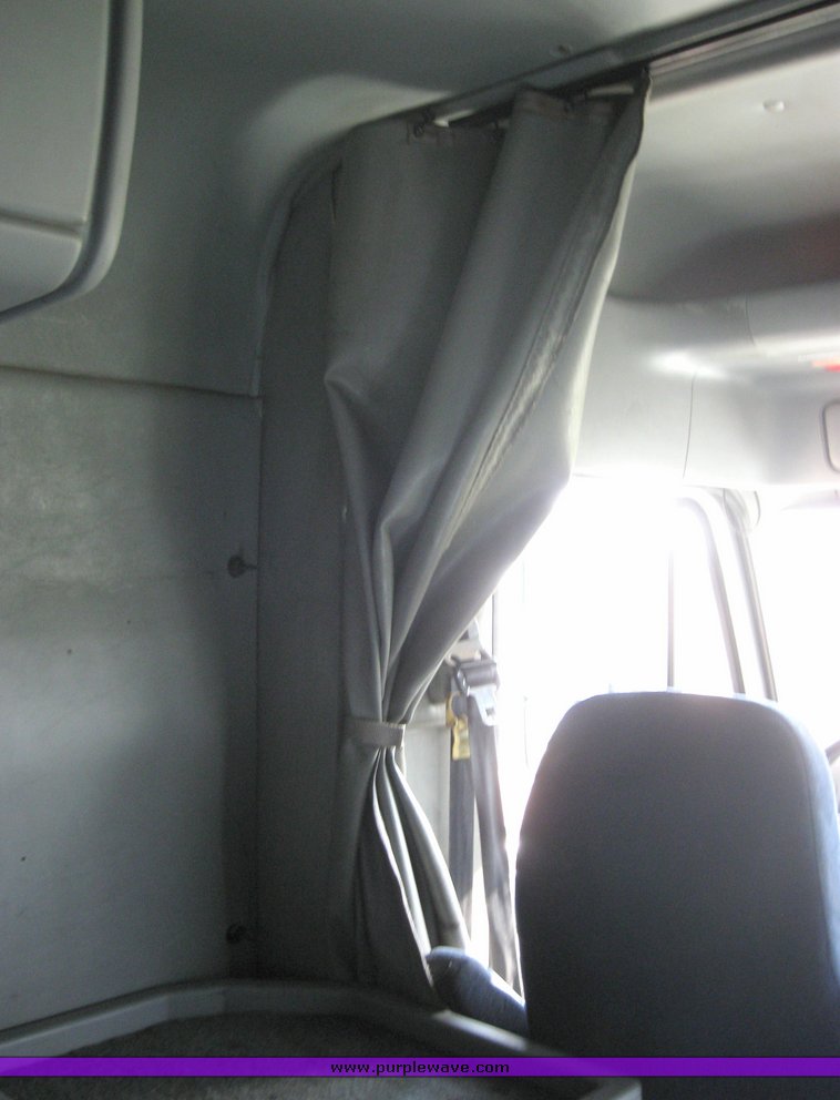 image for item 3969 1998 Freightliner Conventional FLC120 semi tractor