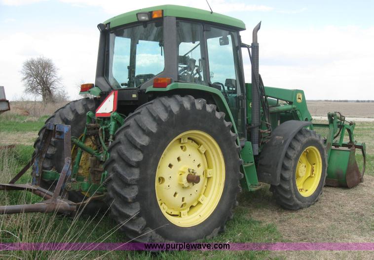 image for item 3985 1998 John Deere 6400 MFWD tractor
