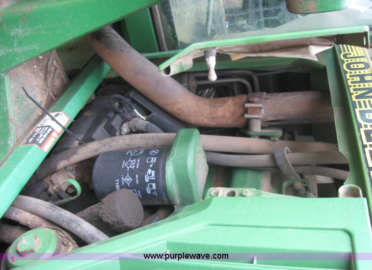 image for item 3985 1998 John Deere 6400 MFWD tractor