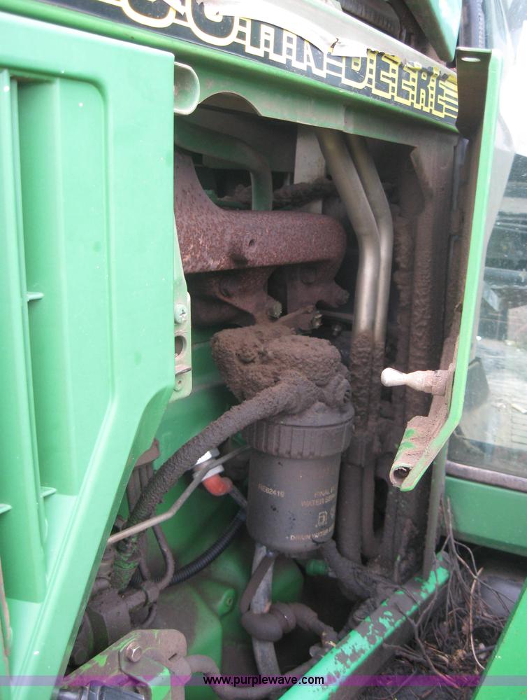 image for item 3985 1998 John Deere 6400 MFWD tractor