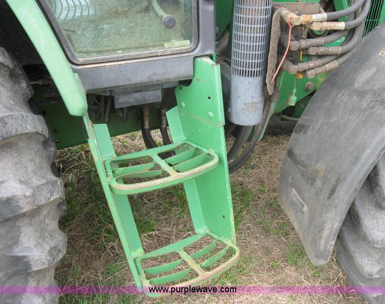 image for item 3985 1998 John Deere 6400 MFWD tractor