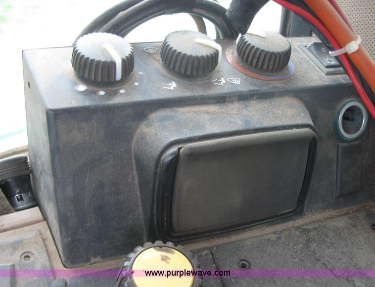 image for item 3985 1998 John Deere 6400 MFWD tractor