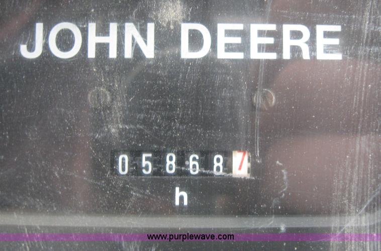 image for item 3985 1998 John Deere 6400 MFWD tractor