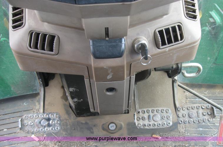 image for item 3985 1998 John Deere 6400 MFWD tractor