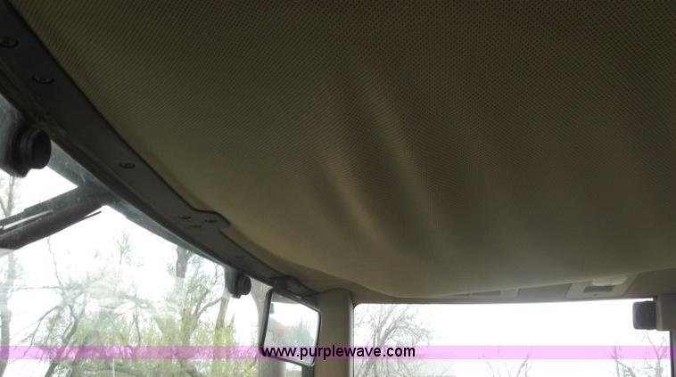 image for item 3985 1998 John Deere 6400 MFWD tractor