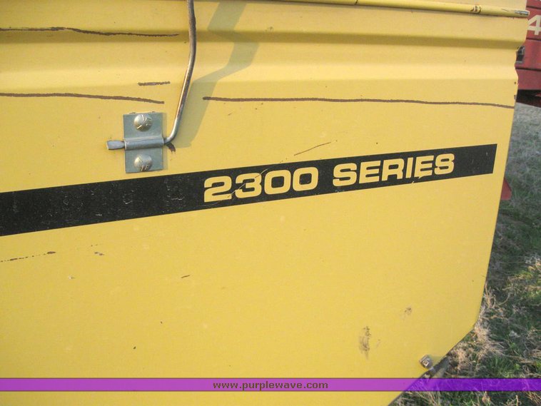 image for item 6152 New Holland 2450 18' swather