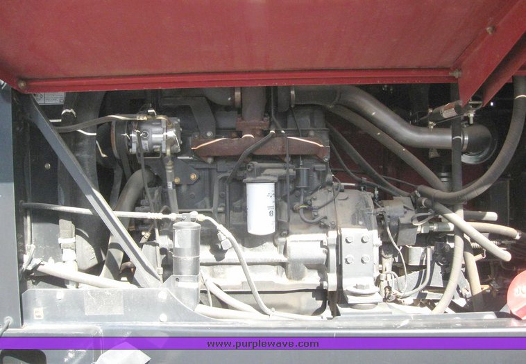 image for item 6158 2003 Case WDX 1101 18' swather