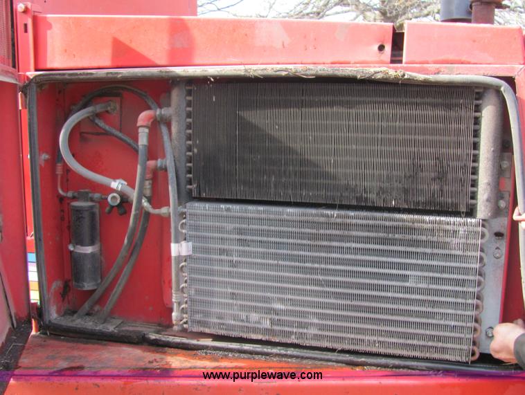 image for item 6768 1991 Mac Don 9000 self-propelled swather