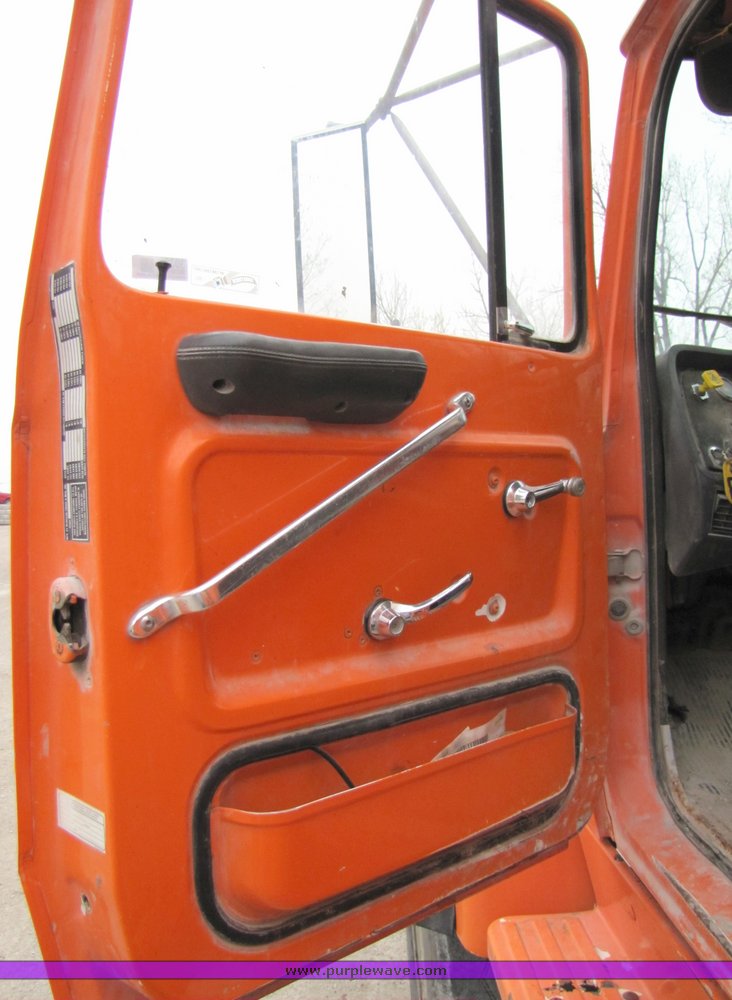 image for item 3036 1994 Ford L9000 tandem axle concrete truck