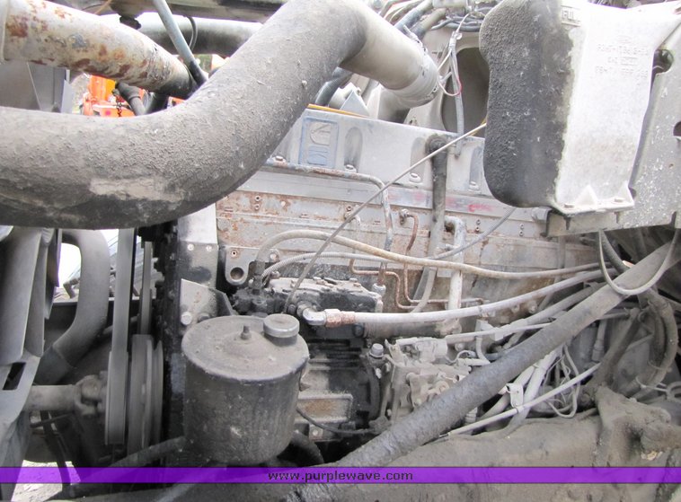 image for item 3036 1994 Ford L9000 tandem axle concrete truck