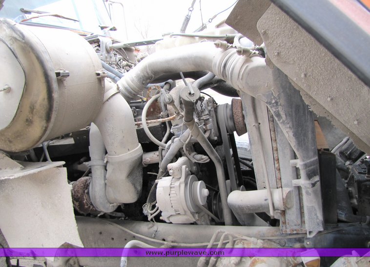 image for item 3036 1994 Ford L9000 tandem axle concrete truck