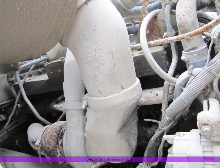 image for item 3036 1994 Ford L9000 tandem axle concrete truck