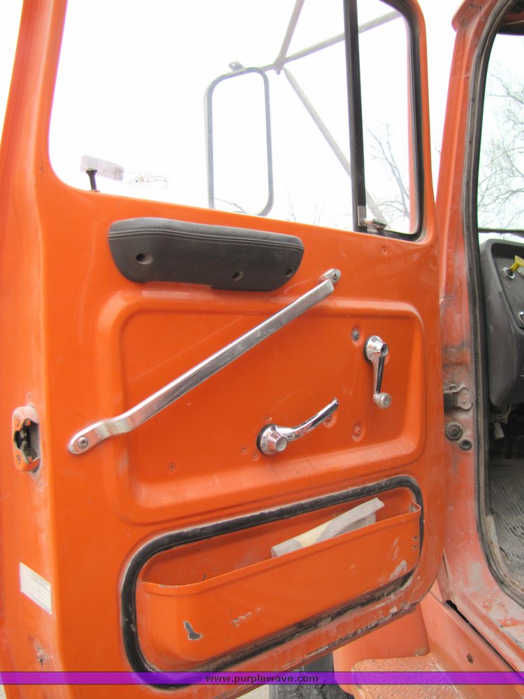 image for item 3037 1994 Ford L9000 tandem axle concrete mixer truck