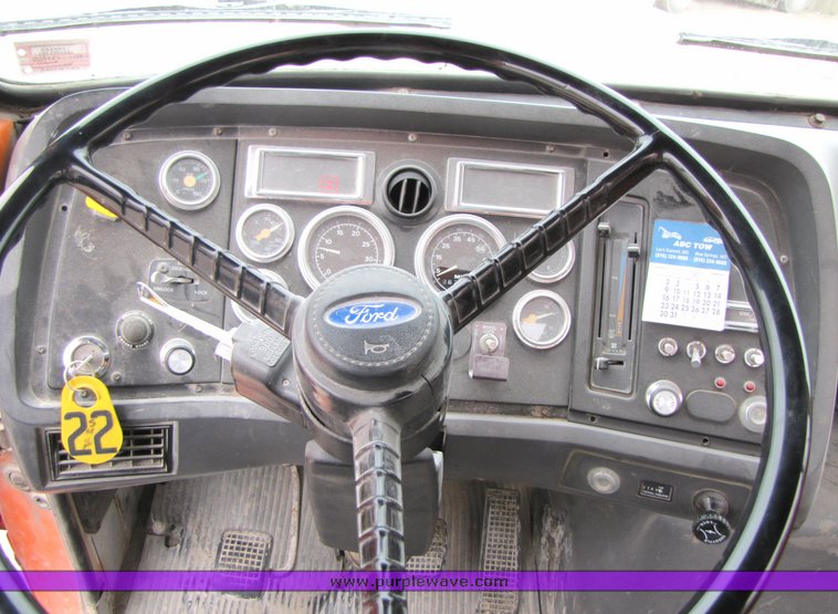 image for item 3037 1994 Ford L9000 tandem axle concrete mixer truck