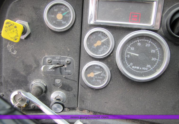 image for item 3037 1994 Ford L9000 tandem axle concrete mixer truck