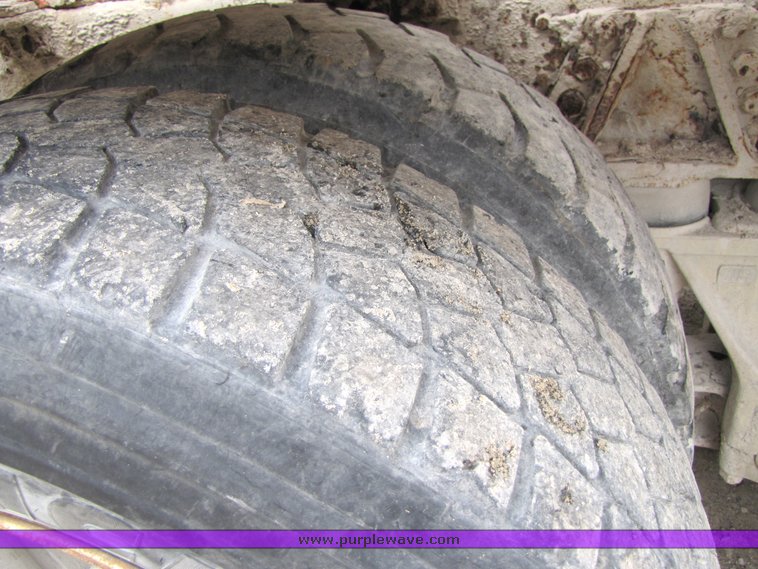 image for item 3037 1994 Ford L9000 tandem axle concrete mixer truck