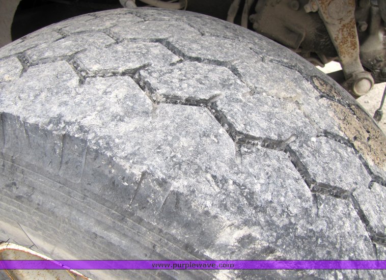 image for item 3037 1994 Ford L9000 tandem axle concrete mixer truck