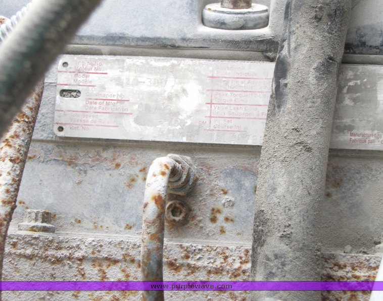 image for item 3037 1994 Ford L9000 tandem axle concrete mixer truck