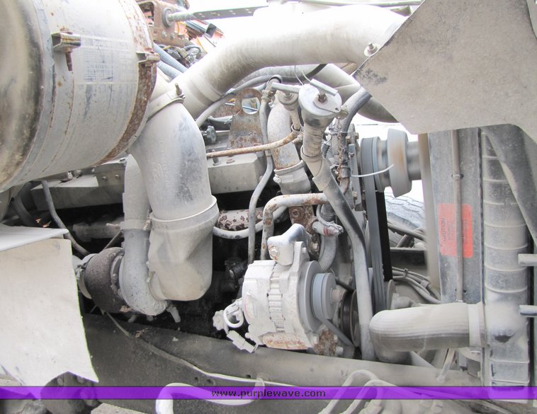 image for item 3037 1994 Ford L9000 tandem axle concrete mixer truck