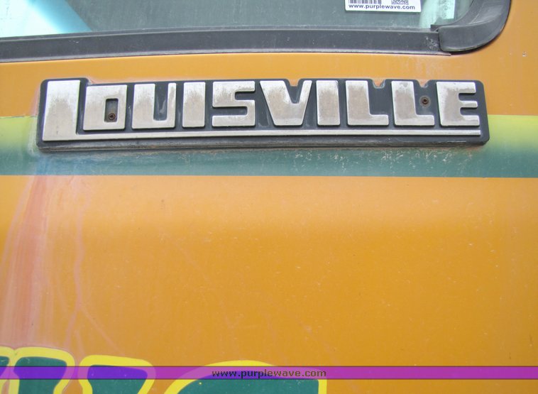 image for item 3038 1996 Ford Louisville tandem axle concrete truck