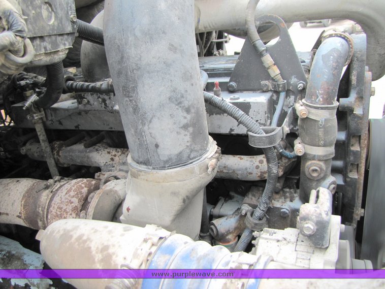 image for item 3038 1996 Ford Louisville tandem axle concrete truck