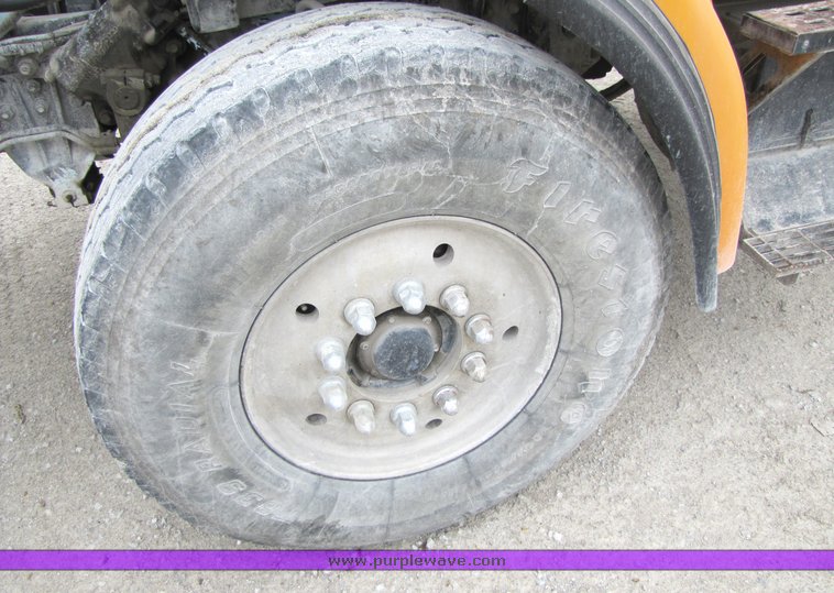 image for item 3038 1996 Ford Louisville tandem axle concrete truck