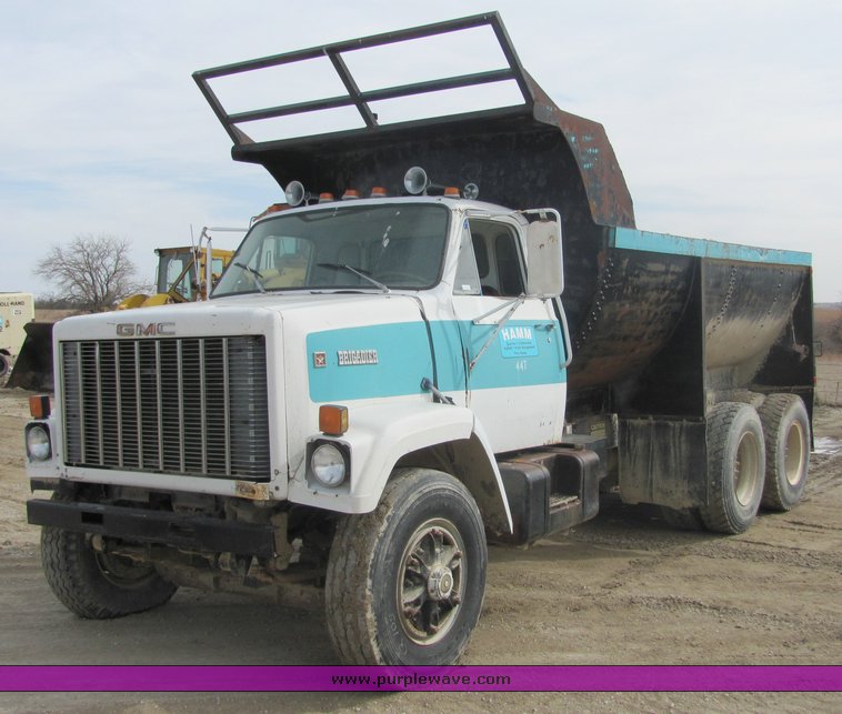 image for item 3095 1979 GMC Brigadier tandem axle barrel bed dump truck
