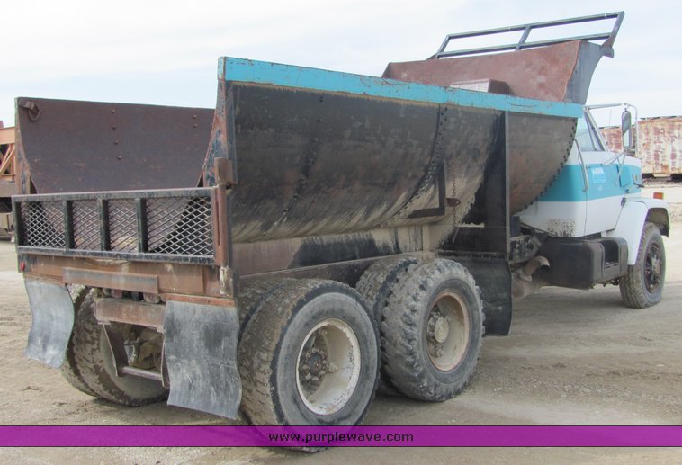 image for item 3095 1979 GMC Brigadier tandem axle barrel bed dump truck
