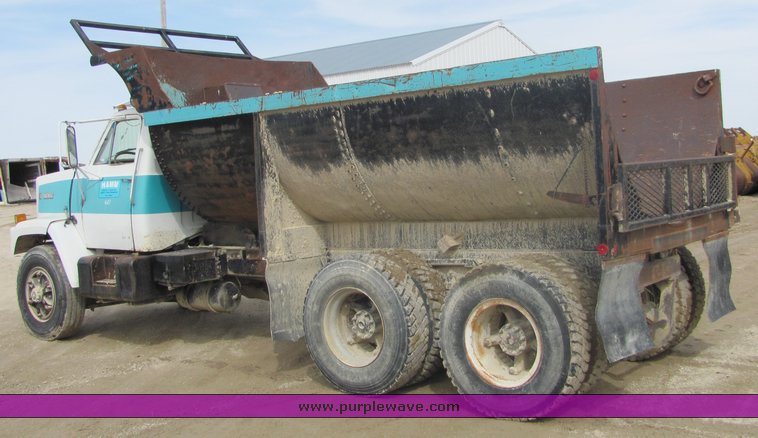 image for item 3095 1979 GMC Brigadier tandem axle barrel bed dump truck